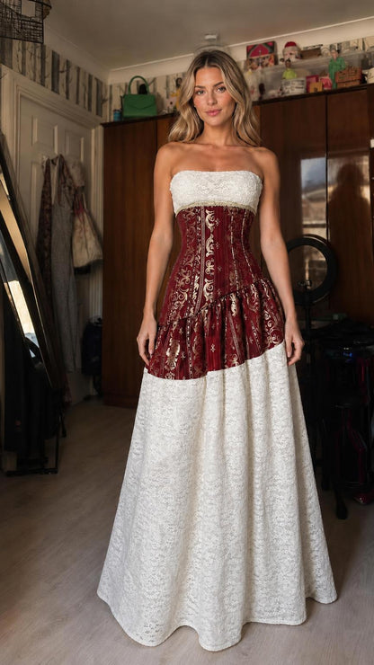 Front view of burgundy strapless colorblock corset maxi dress