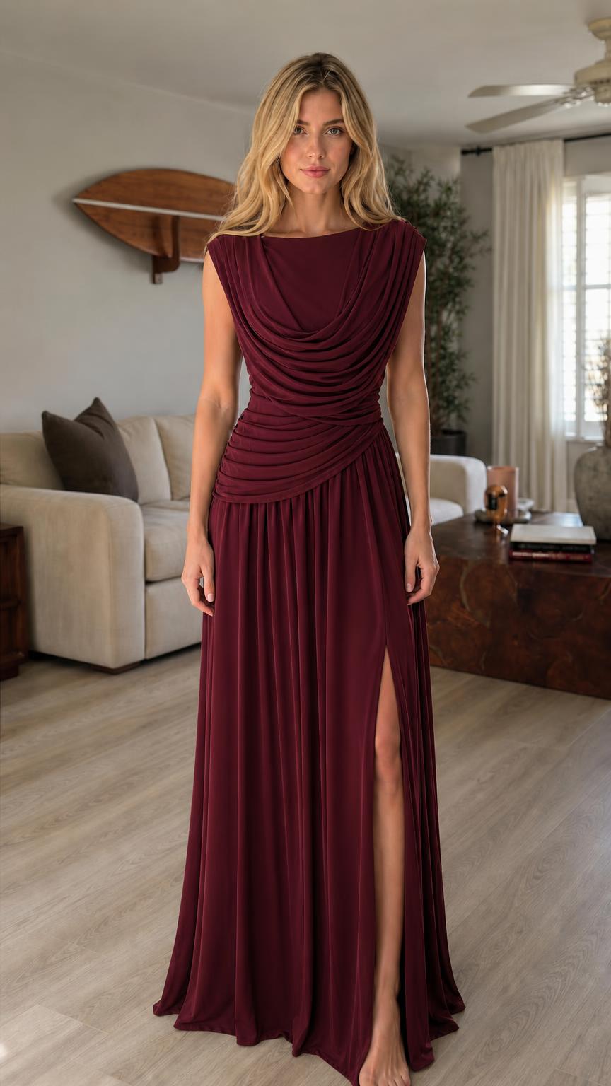 Model wearing burgundy cowl neck maxi dress with high slit