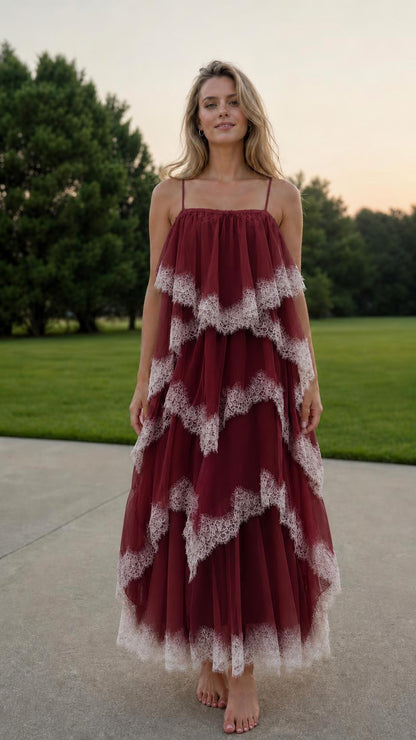 Front view of model wearing burgundy tiered tulle maxi dress