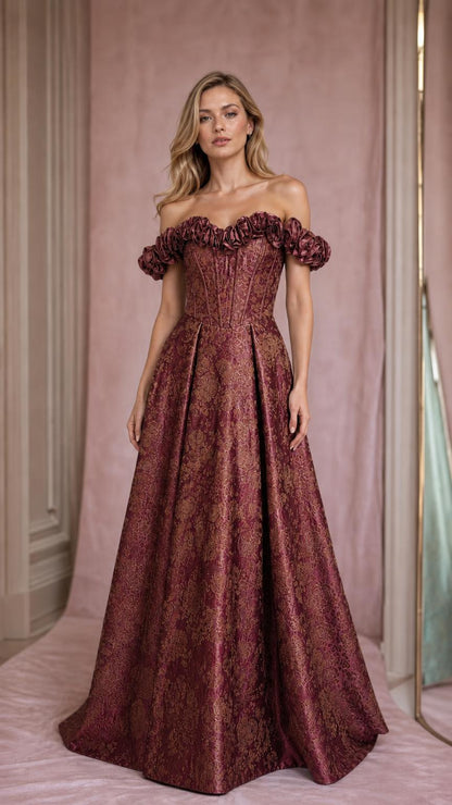 Model wearing burgundy off-shoulder brocade evening gown