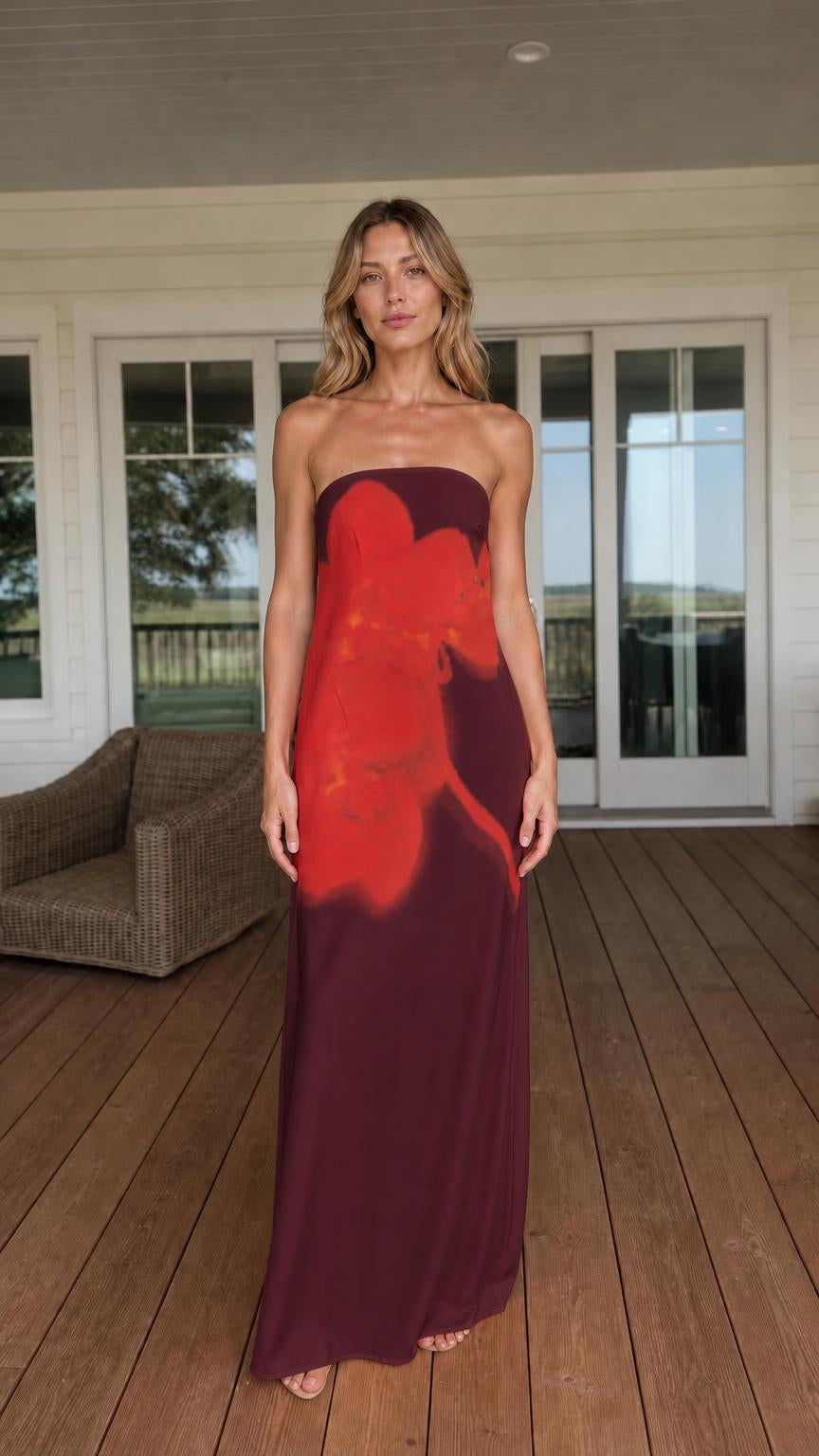 Woman wearing burgundy strapless abstract floral maxi dress