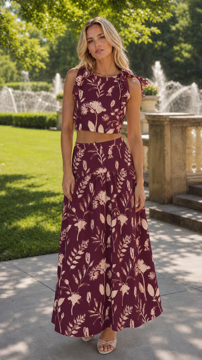 Woman wearing burgundy floral two-piece set outdoors