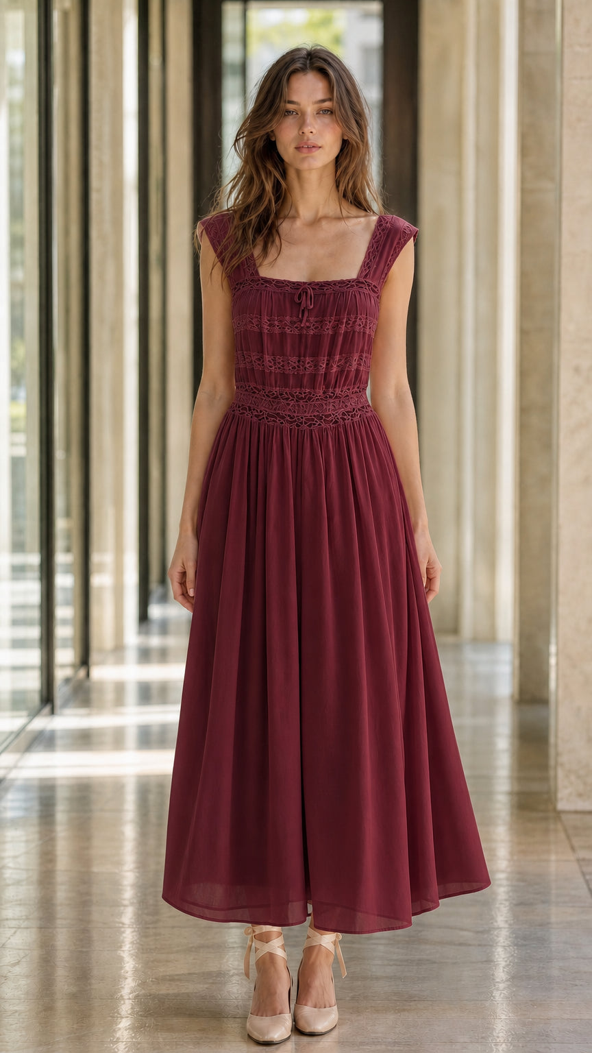 Front view of model wearing burgundy midi dress