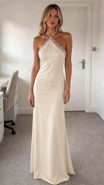 Model wearing champagne halter neck lace trim satin maxi dress