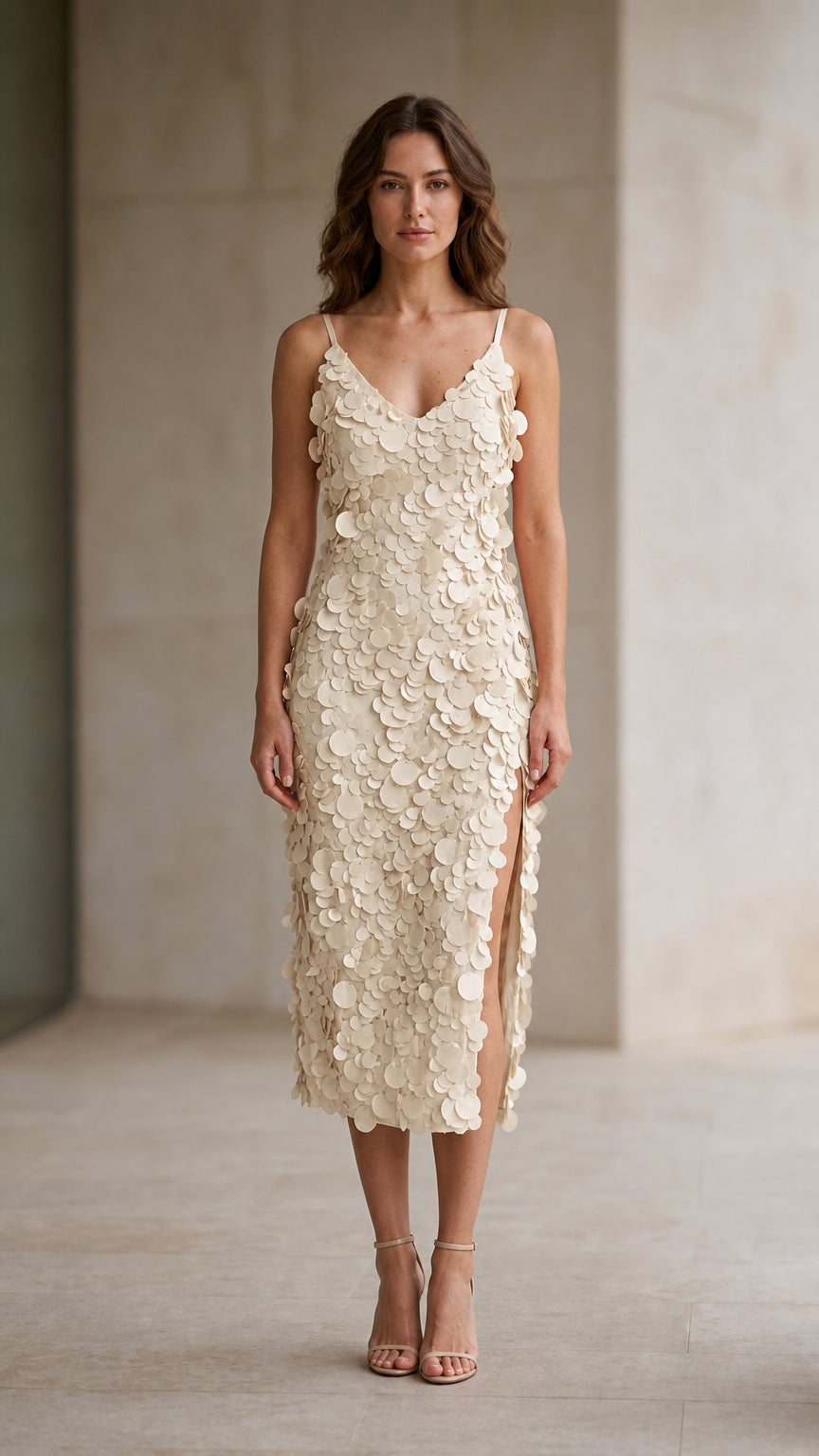 Model wearing champagne 3D petal applique midi dress