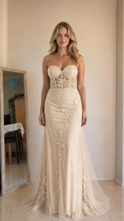Front view of champagne strapless mermaid evening gown