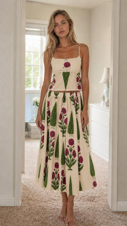 Woman wearing cream floral print cami top and midi skirt set