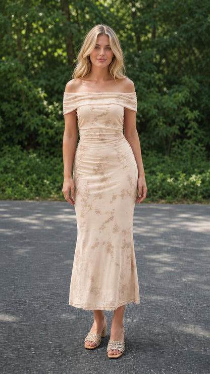 Model wearing beige off-the-shoulder ruched floral midi dress, front view