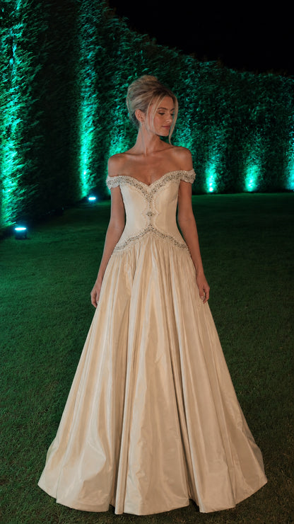 Champagne variant of the off-shoulder evening ball gown