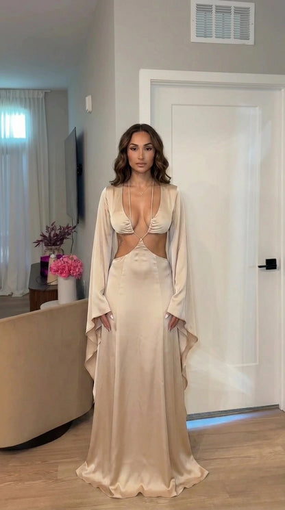 Front view of model wearing champagne cutout maxi dress