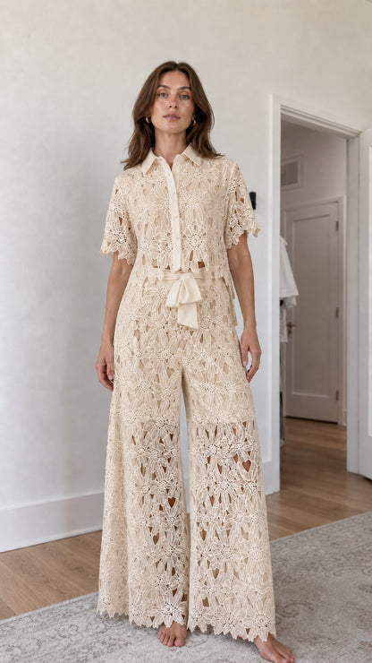 Woman wearing champagne floral lace shirt and wide-leg pants set