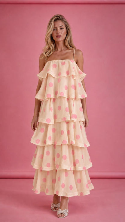 Model wearing beige polka dot tiered ruffle midi dress