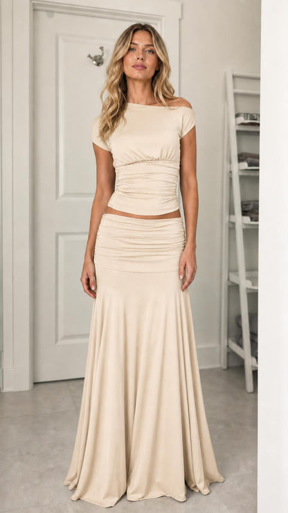 Model wearing beige ruched two-piece set