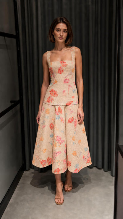 Front view of beige floral tweed top and midi skirt set