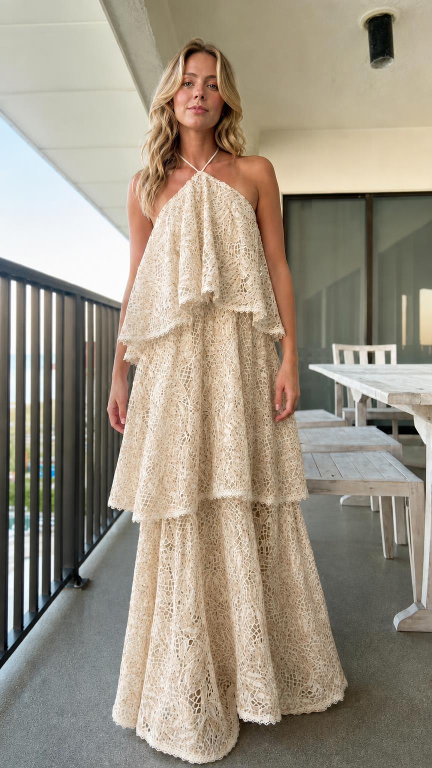 Model wearing beige tiered halter lace maxi dress
