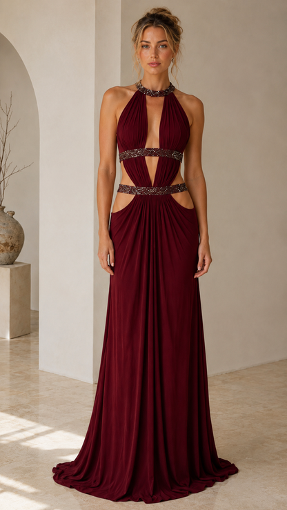 Model wearing burgundy evening maxi dress with sparkling details