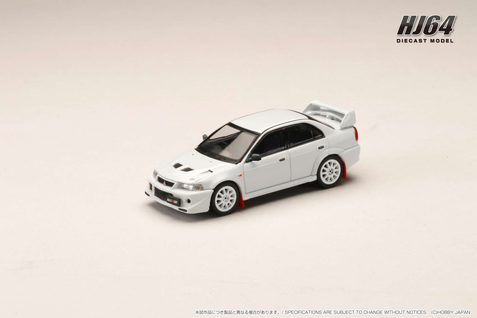 Hobby Japan 1:64 Mitsubishi Lancer GSR EVO 6 (T.M.E.) Monte Carlo Edition in Scortia White